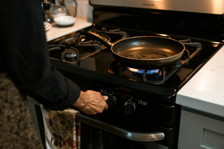 cleaning gas stove burners in Indian kitchen